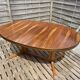 Oval table Baumann, two extensions, rosewood top.