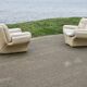 Pair of leather “space age” armchairs. Cream colour". Circa 1970.