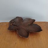 Empty carved wooden pocket black forest style vine pampre