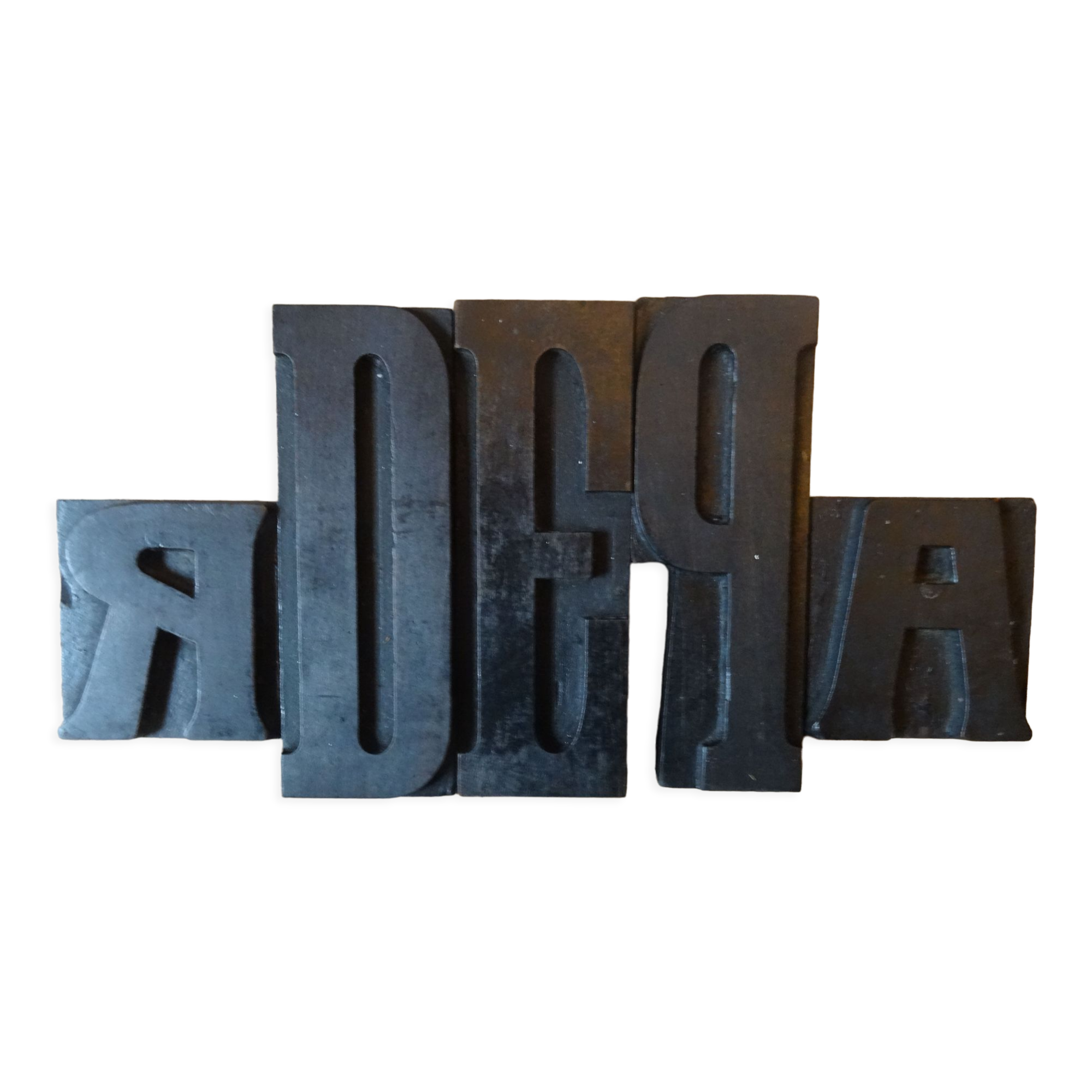 3 wooden printing letters
