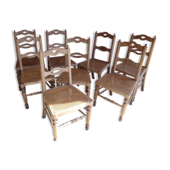 Suite of oak chairs; canated seats