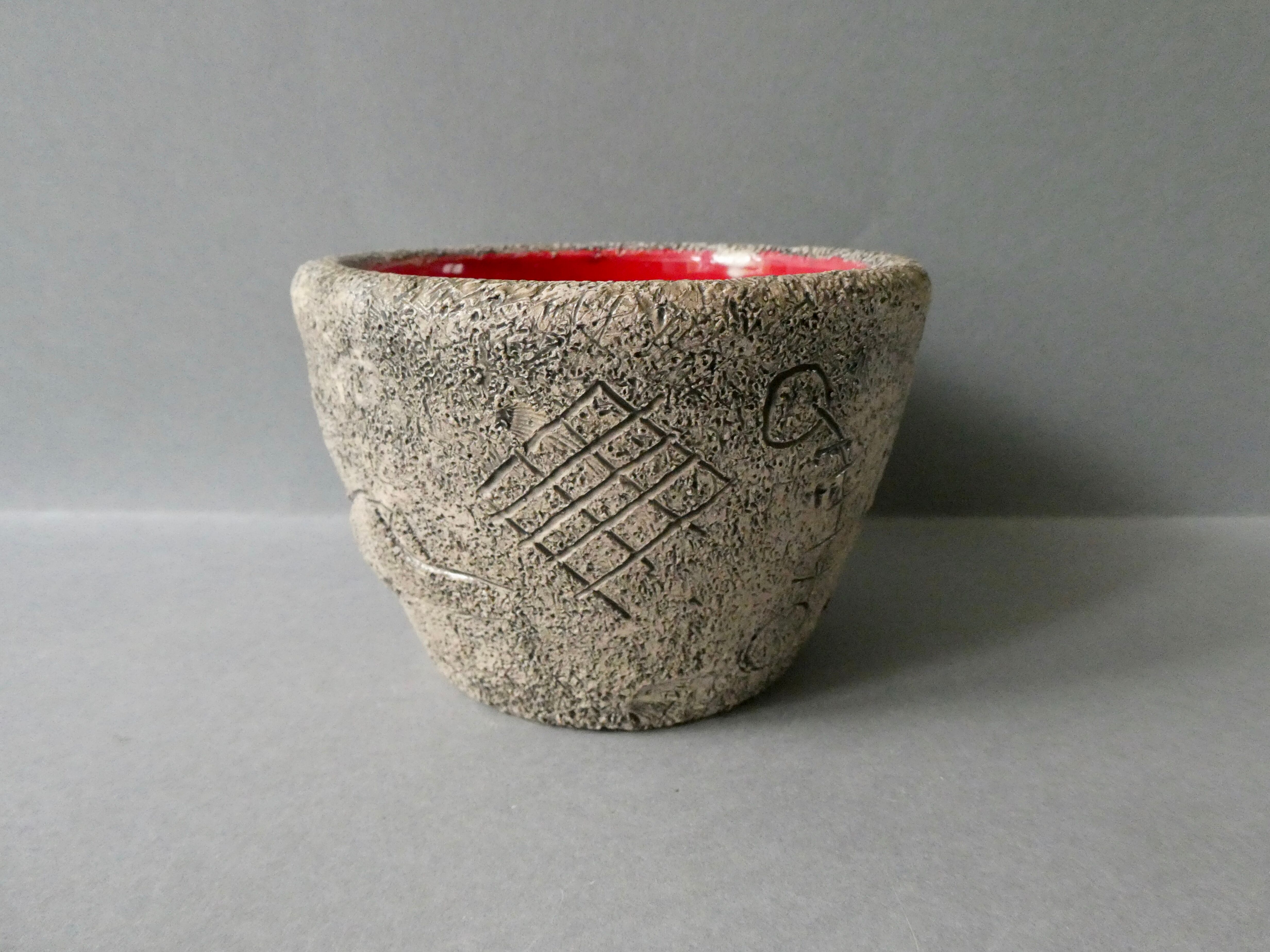 Red enamelled sandstone cup, Francis Triay, 50/60