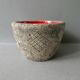 Red enamelled sandstone cup, Francis Triay, 50/60