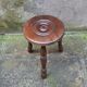 Turned wooden tripod stool
