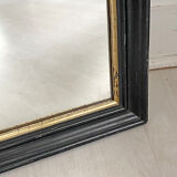 Black wood mirror and gold edging