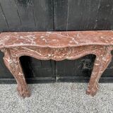 Louis XV style fireplace in rancid marble around 1900