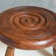 Low tripod stool in vintage turned solid wood