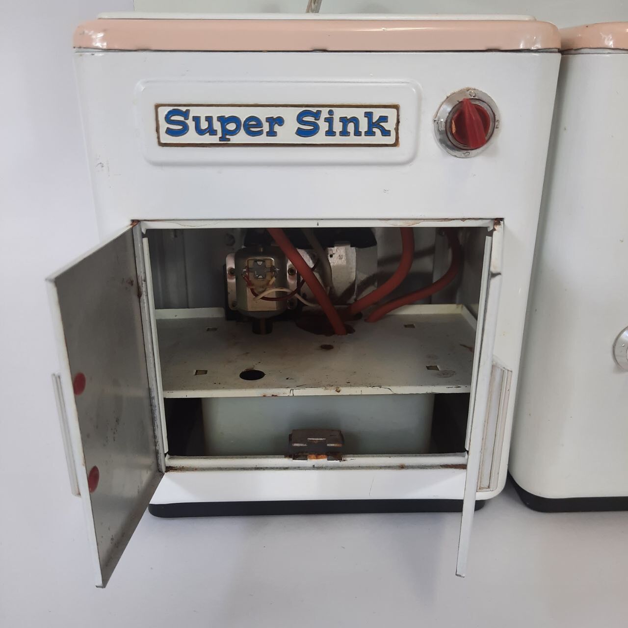 Miniature vintage toy kitchen