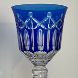 Set of twelve glasses in crystal tinted in different colours and cut with stars.