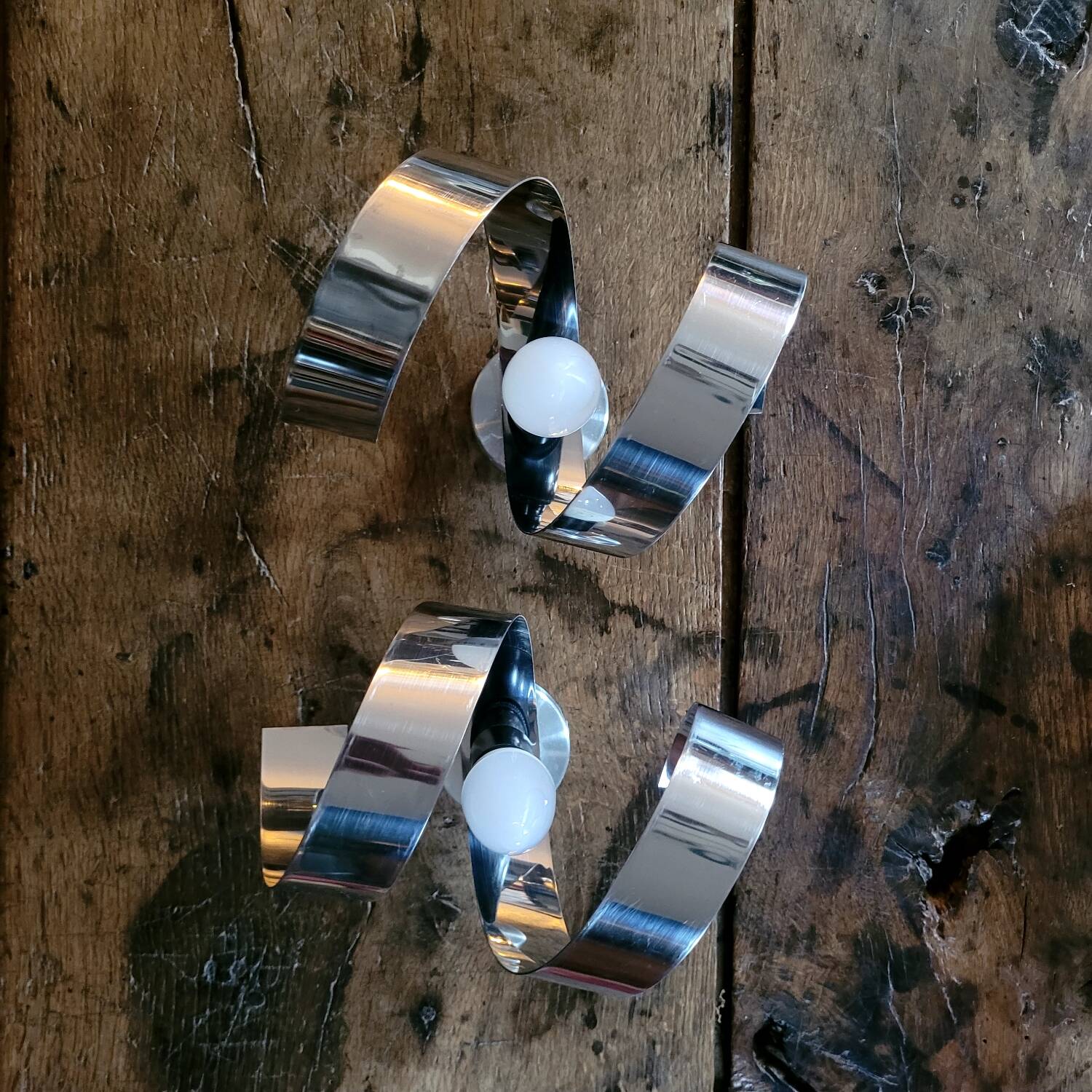 Pair of 70s chrome metal wall lights
