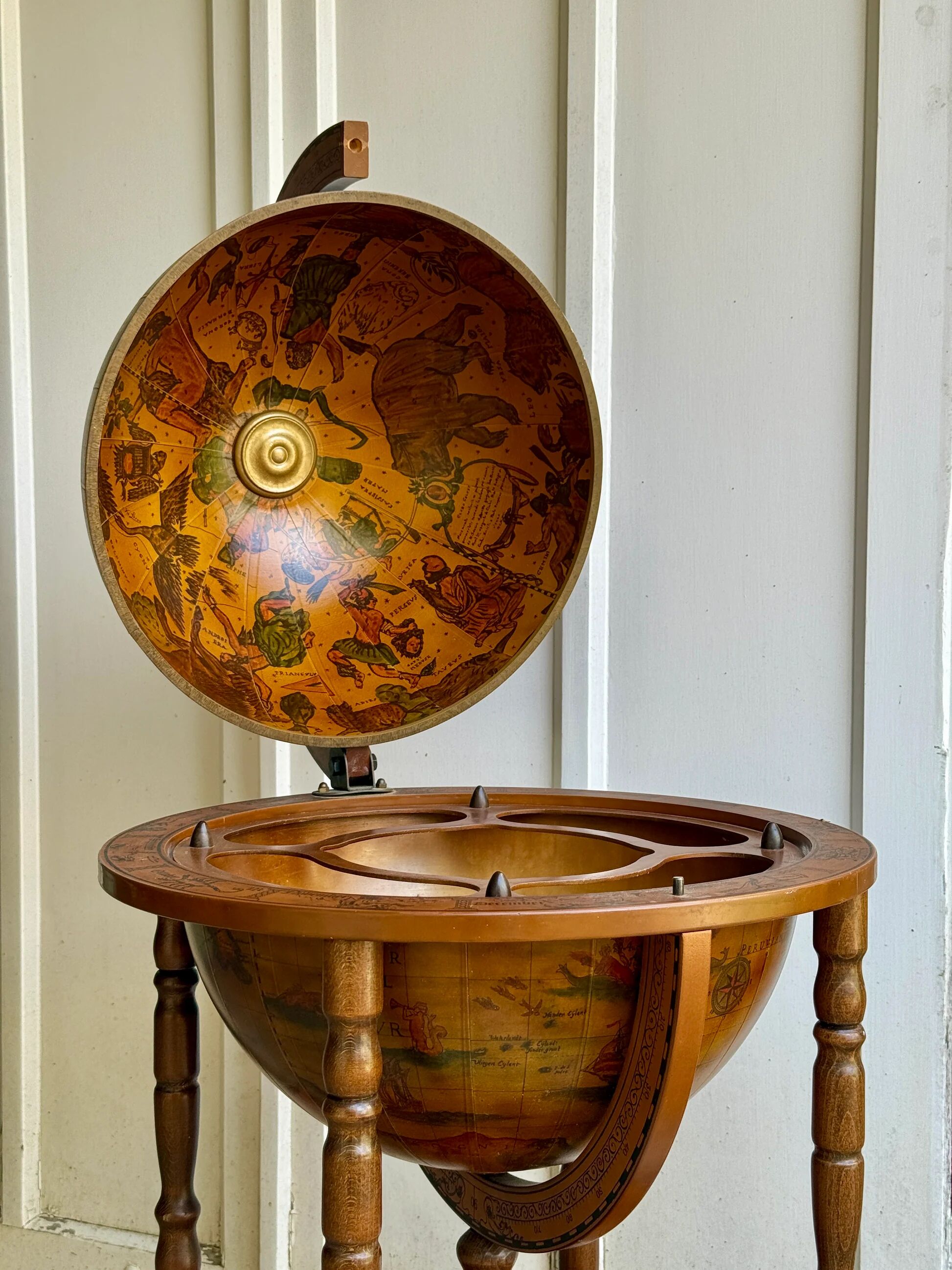 Globe bar on wheels with a rotating tray