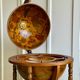 Globe bar on wheels with a rotating tray