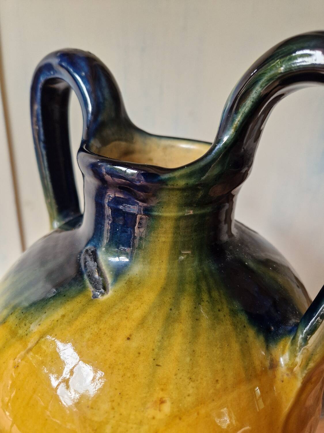 Pottery, jar, old jug in yellow and green glazed terracotta