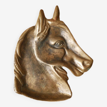 Empty pocket in vintage brass horse head retro cup