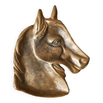 Empty pocket in vintage brass horse head retro cup