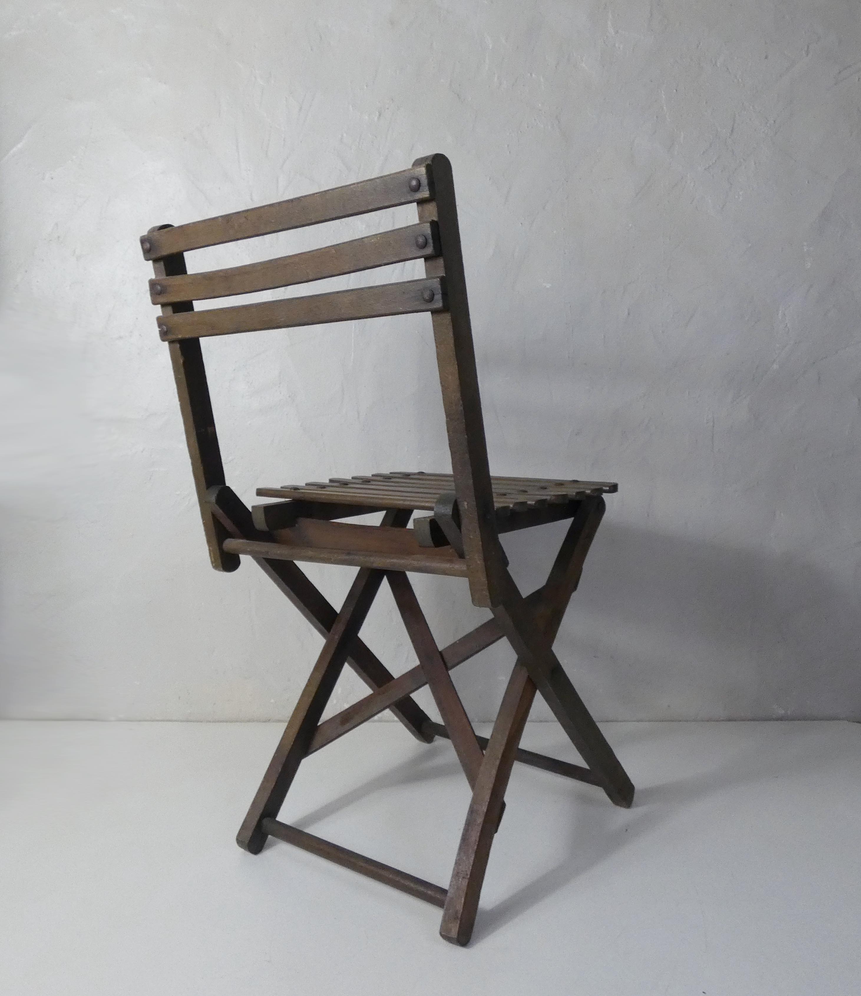 Old folding wooden chair for children