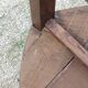 Set of three brutalist tripod armchairs in carved solid oak