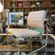 Fauteuil / chauffeuse de salon tissus et chrome Atal 1970