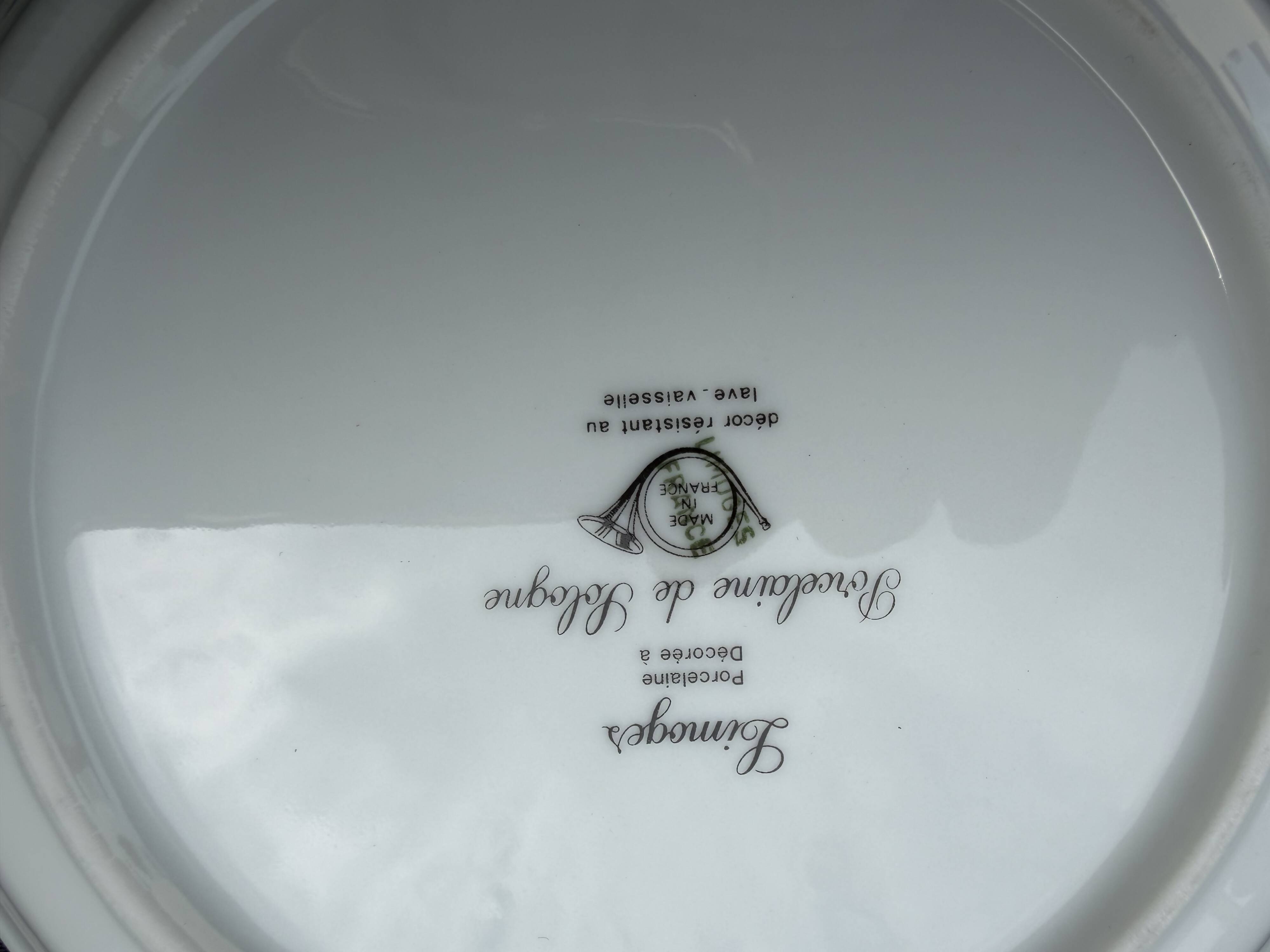 Set of 12 deep porcelain plates from Sologne.
