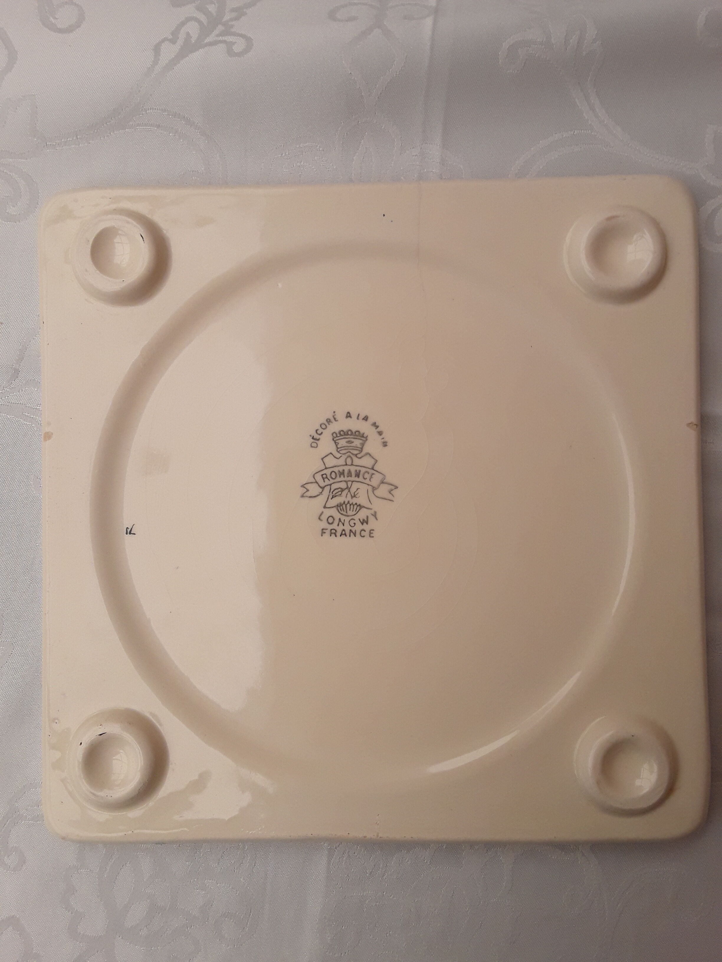 Longwy faience trivety