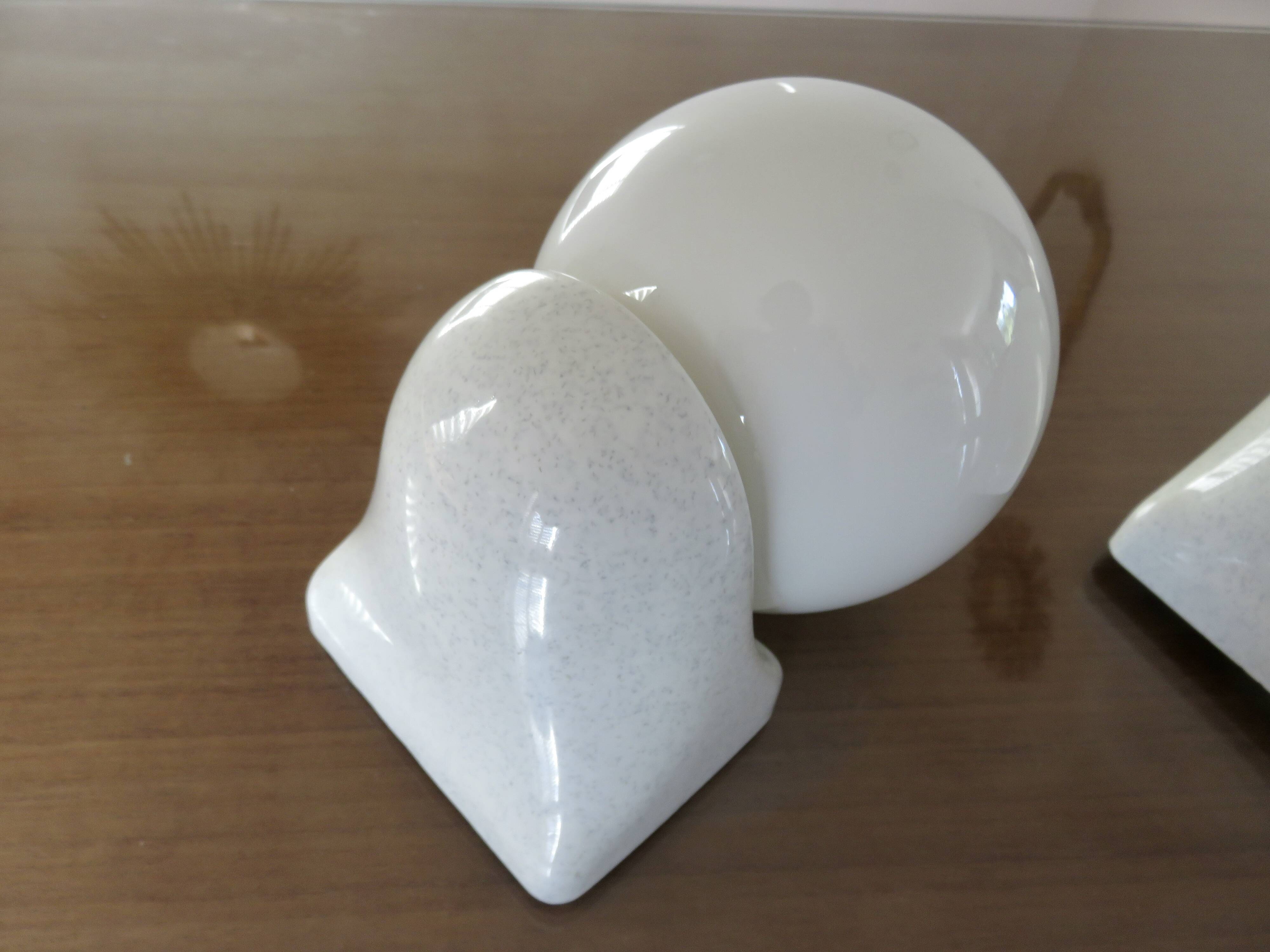 Pair of streamline opaline wall lights from the 80s