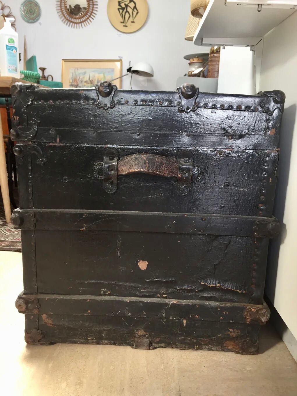 Black ancient travel trunk, 19th