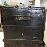 Black ancient travel trunk, 19th