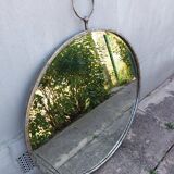 Round patinated mirror