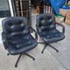 Pair of Comforto armchairs in black leather. Vintage 70s.