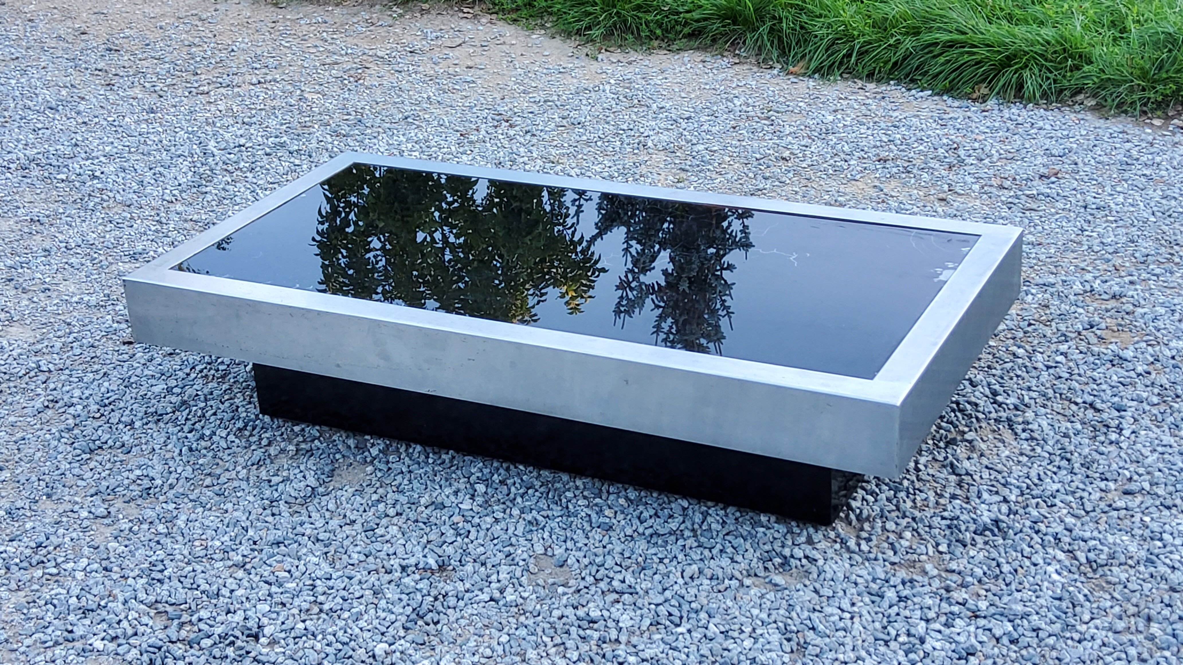 Coffee table in brushed steel and black tinted glass from the 70s