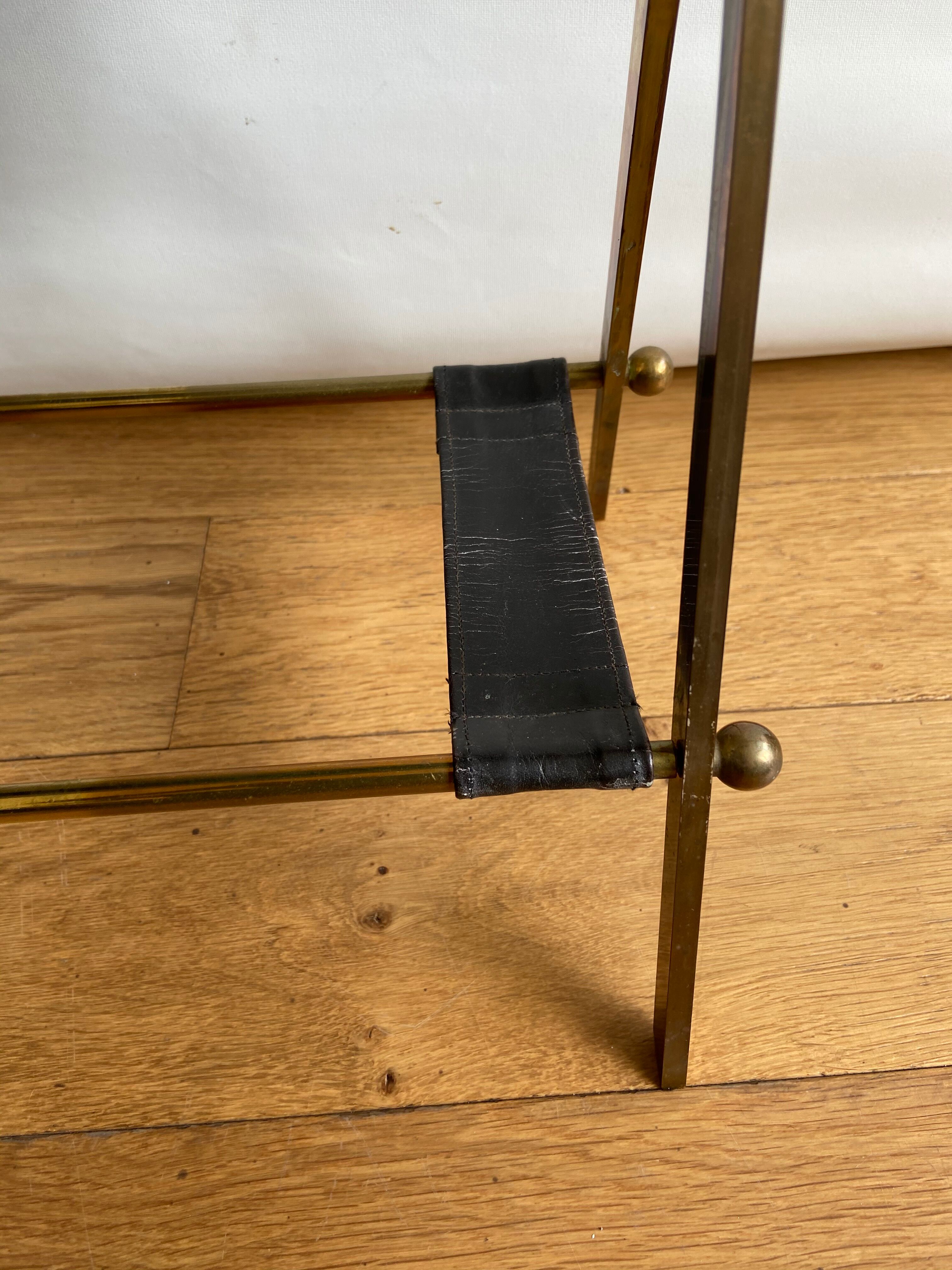 Leather and gilded brass magazine holder