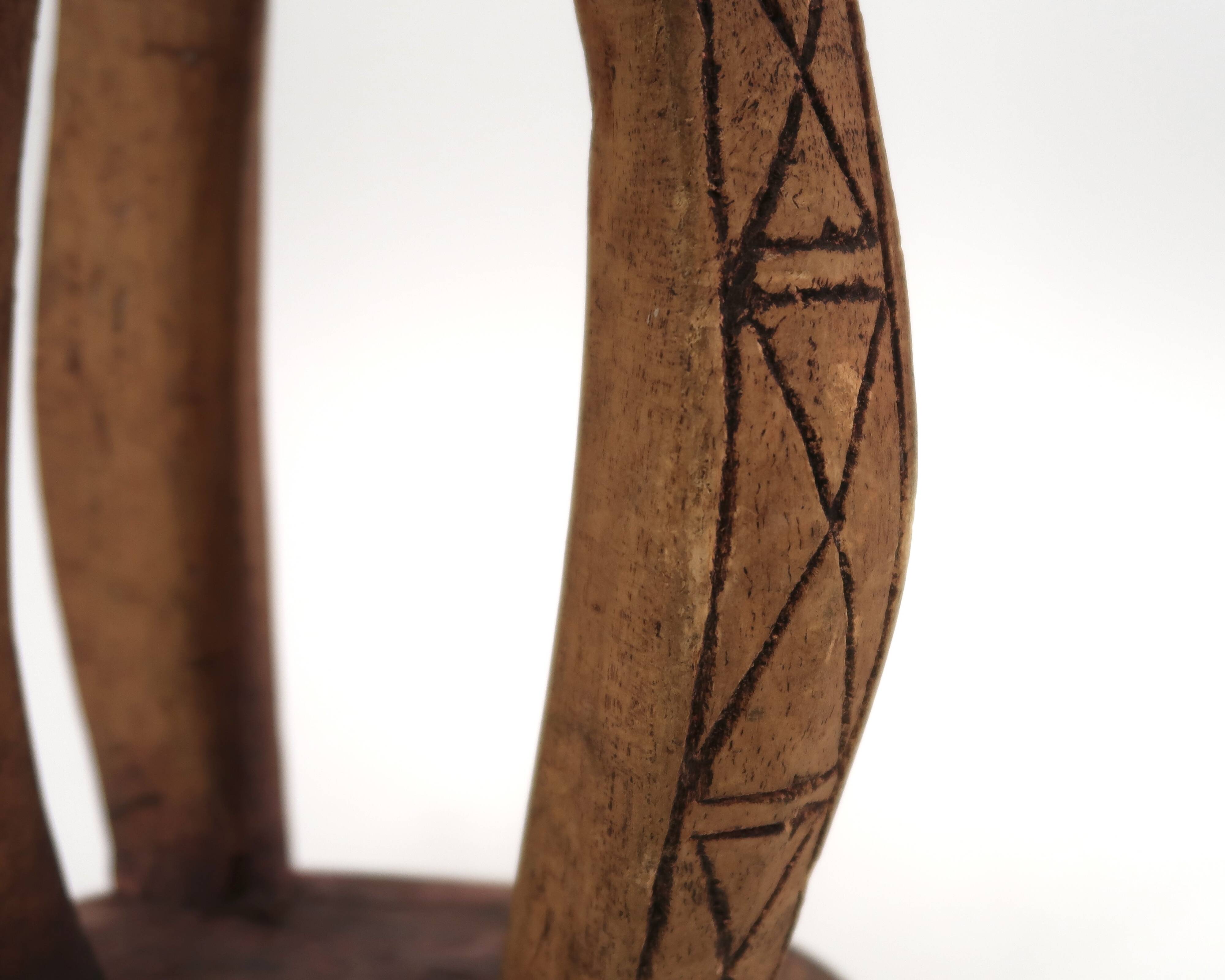 African stool with scarified wooden decoration, 1980s