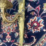 Pair of gilt bronze wall sconces with caryatid and Atlante decoration, 18th century.