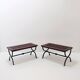 Set of 2 solid wood benches with an openwork design and wrought iron legs.