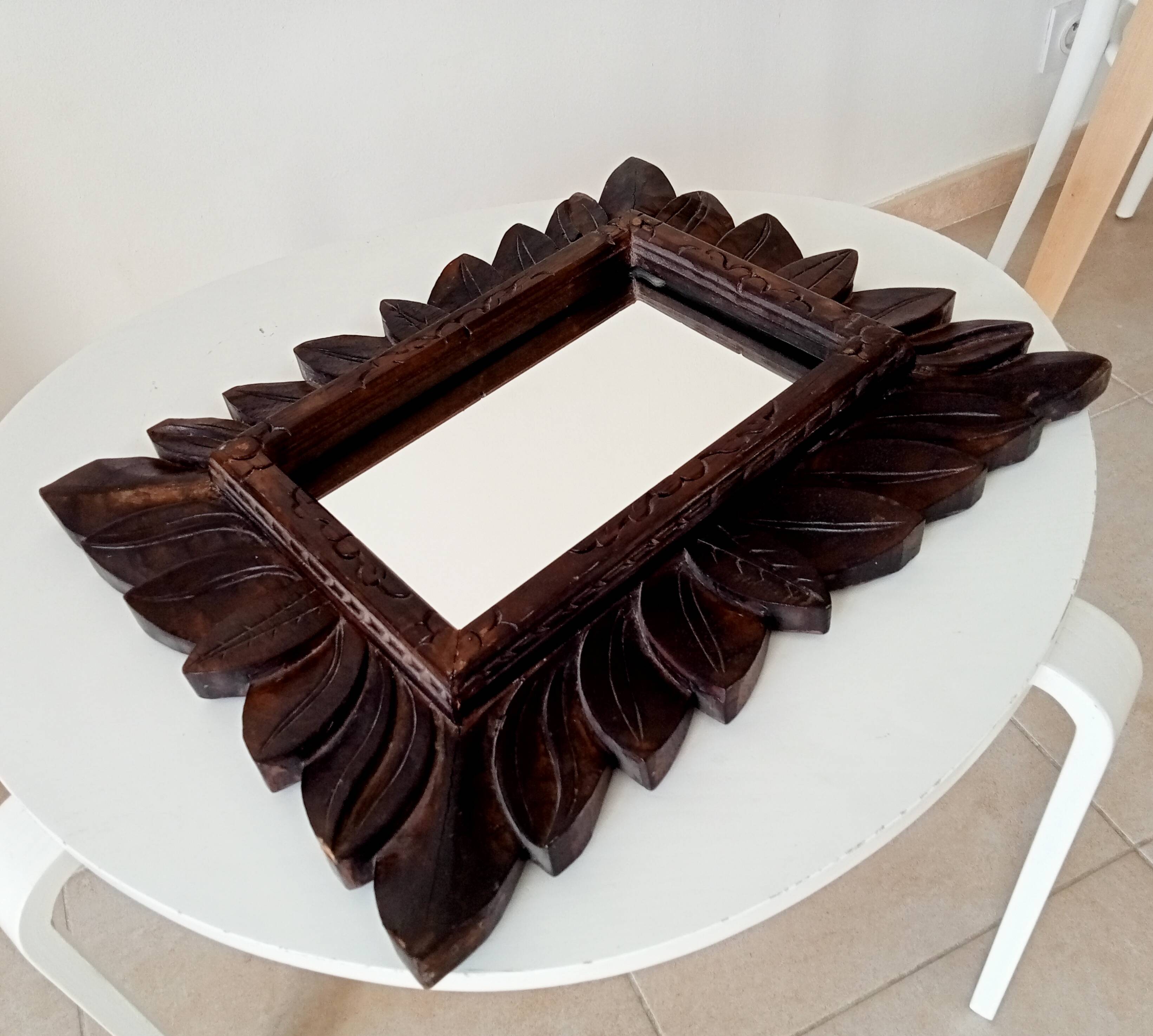 Antique mirror in carved wood