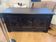 Antique dark wood chest with geometric paneling / pointed