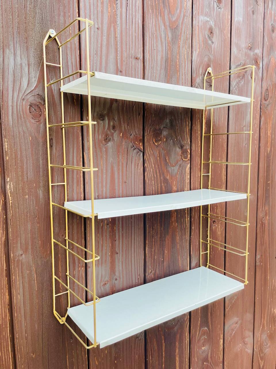 Vintage modular wall shelf, metal and brass, circa 1960s