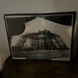 Two photos of the Eiffel Tower under construction