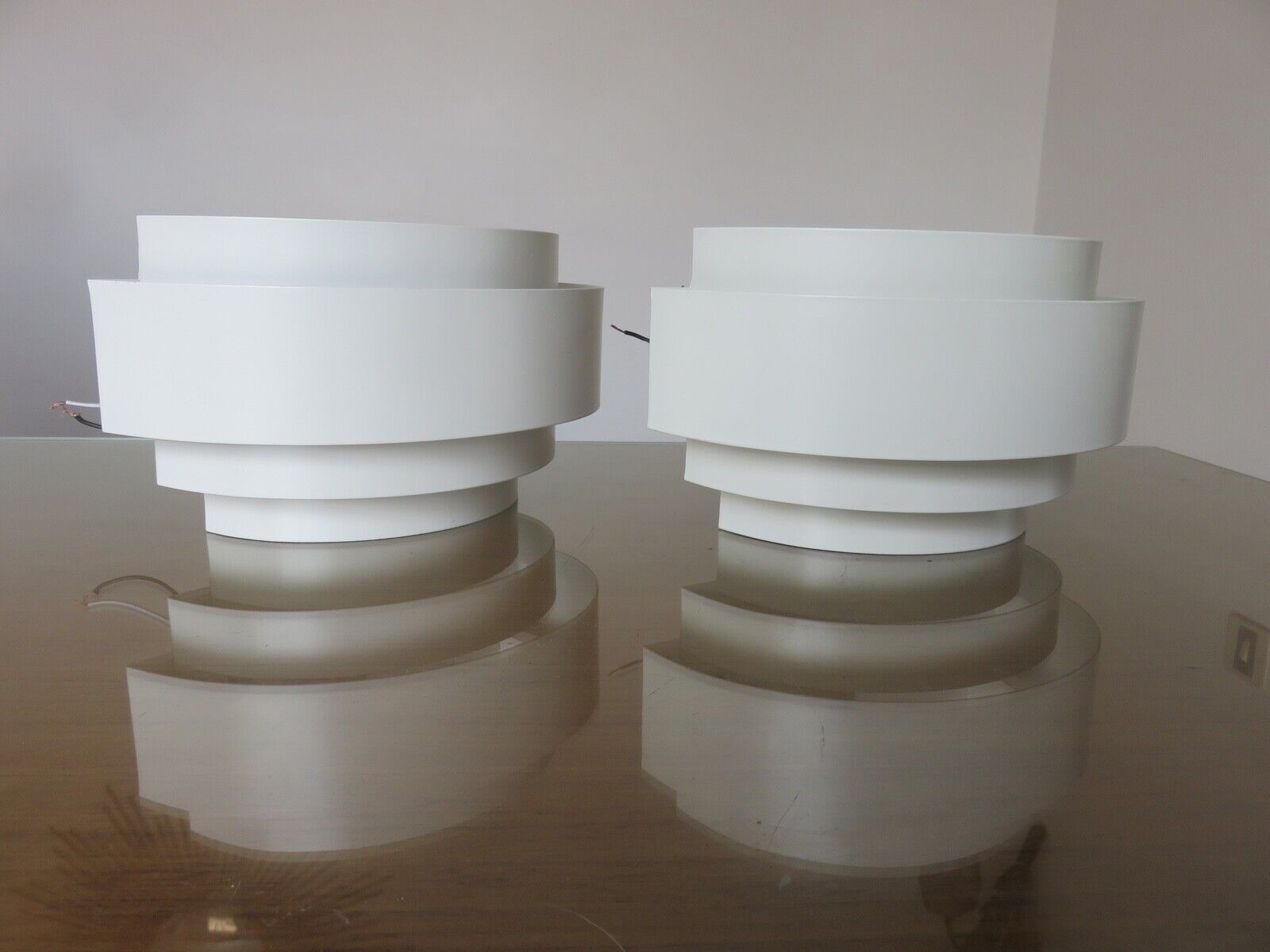 Pair of Scandinavian curved metal sconces 1980