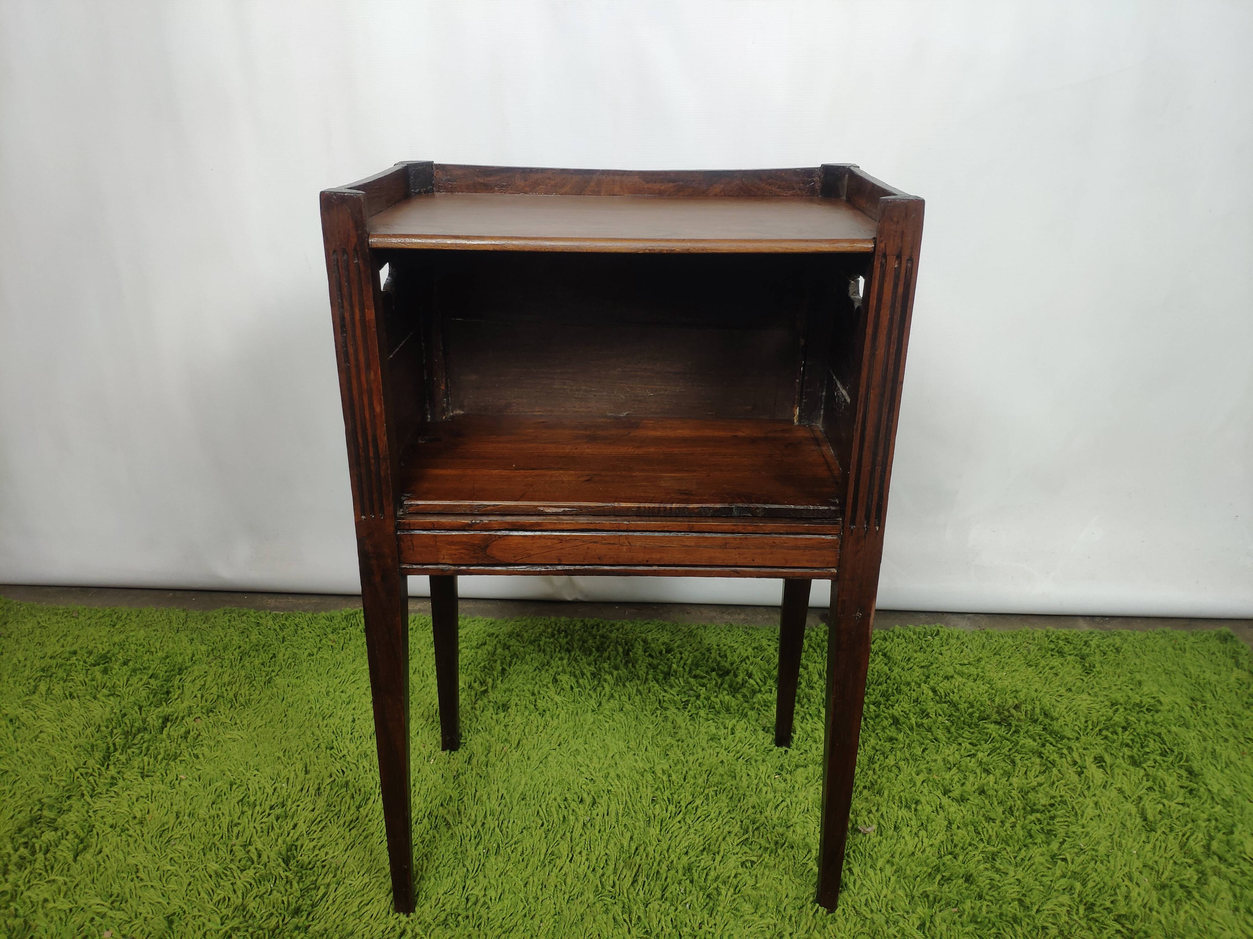 Old wooden bedside table