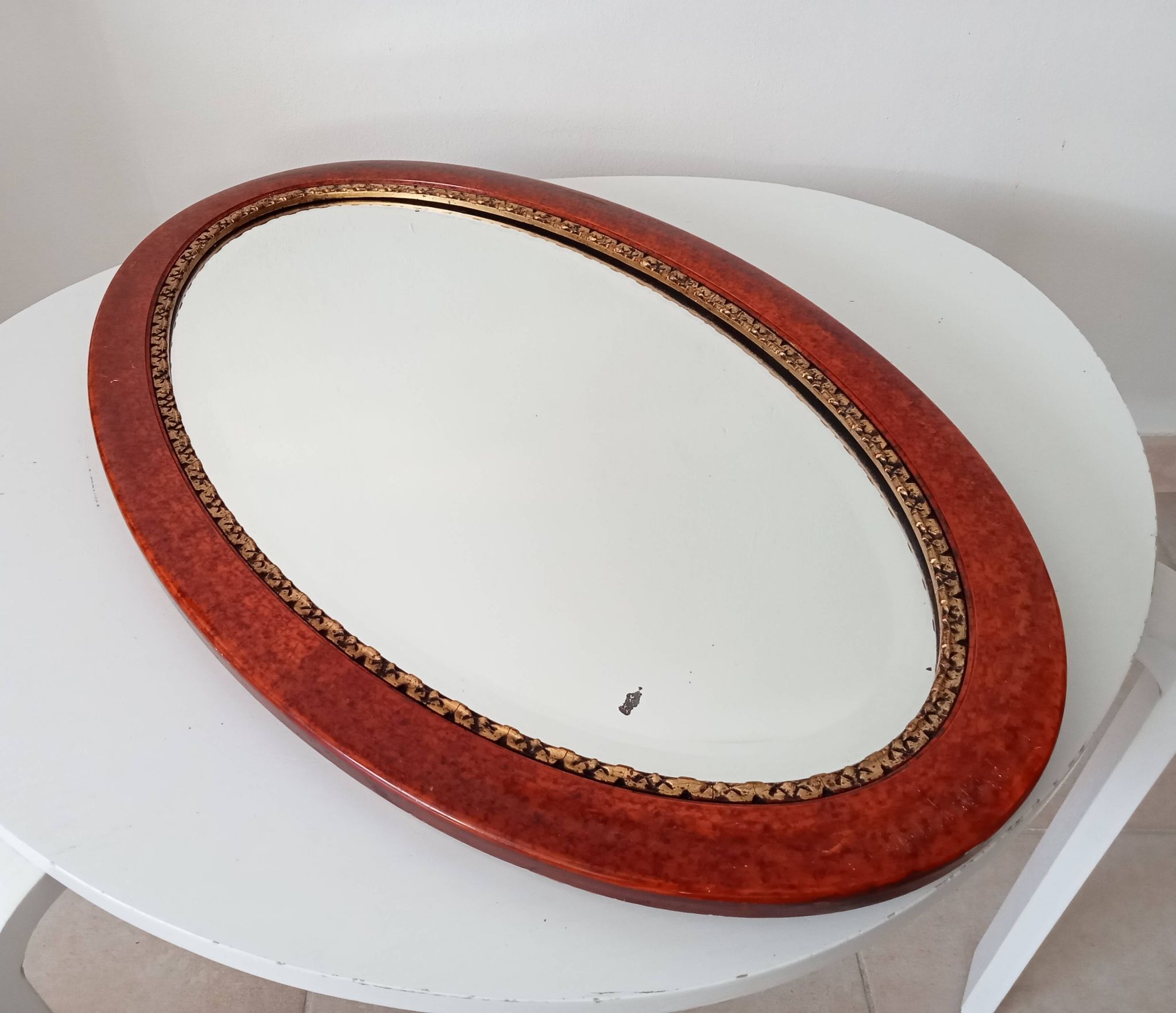 Antique oval mirror with bevelled glass