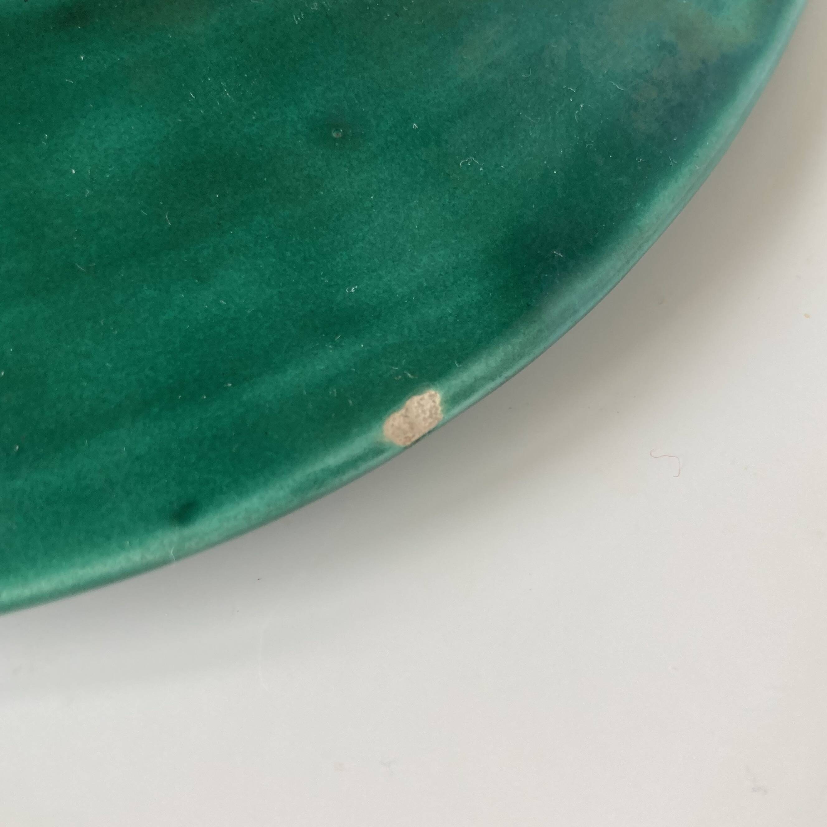 Vallauris - Large oval earthenware "fish" dish with green glaze