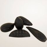 Set of decorative fruits in carved blackened wood.