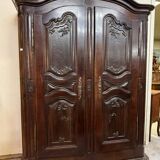 Alsatian wardrobe from the Louis XIII period in solid walnut.