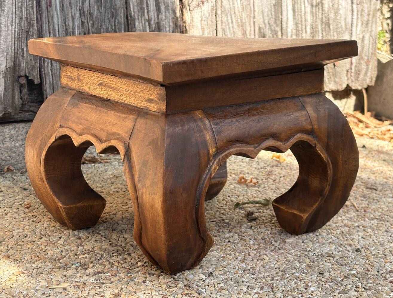 Carved wooden opium holder, traditional Asian style.