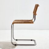 Tubular chair with wicker seat and backrest