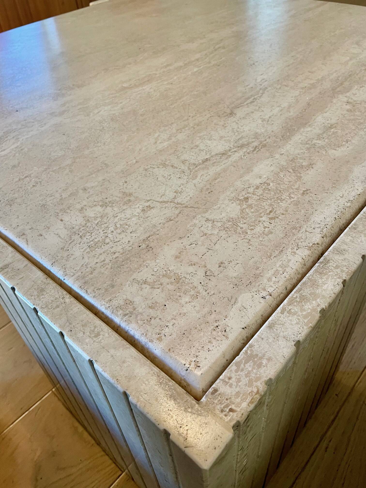 Roche Bobois “eye” travertine table