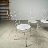 4 vintage wrought iron chairs