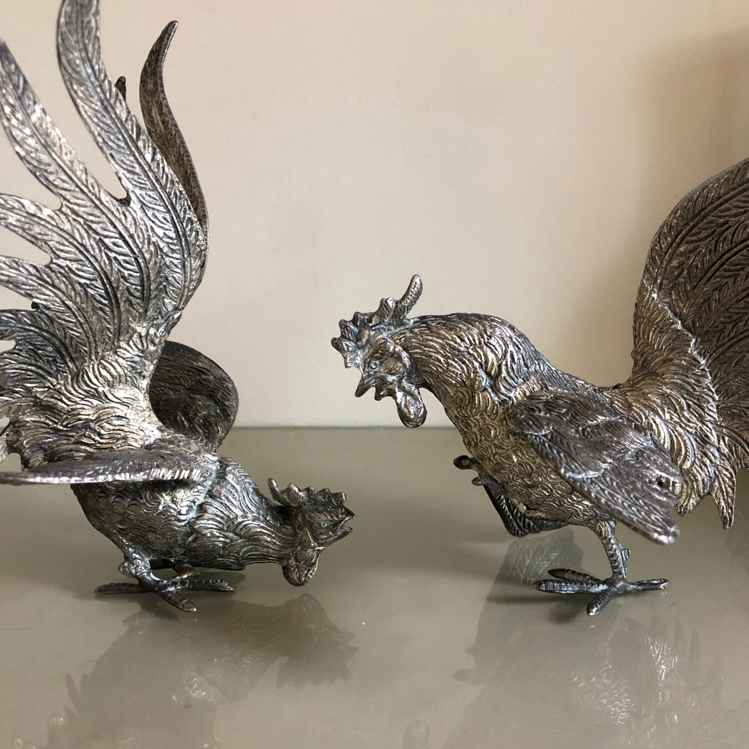 Vintage silver metal roosters