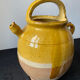 Cruche gargoulette chevrette en terre cuite vernissé jaune